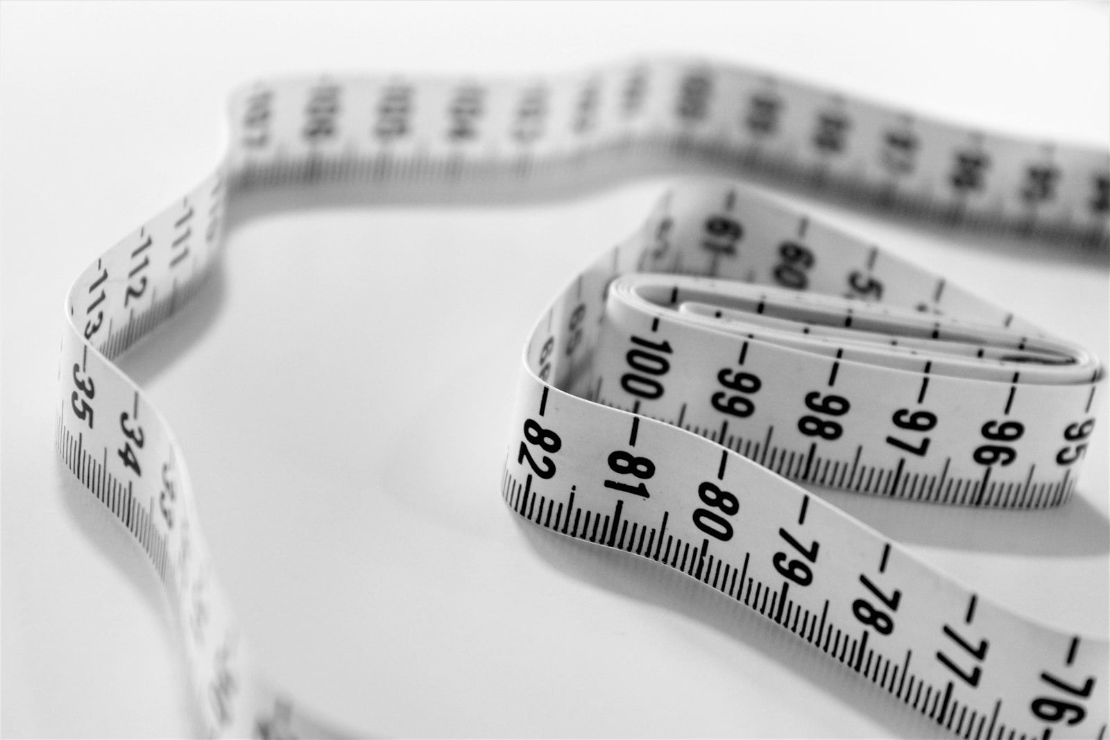 Coiled tape measure, representing weight loss progress
